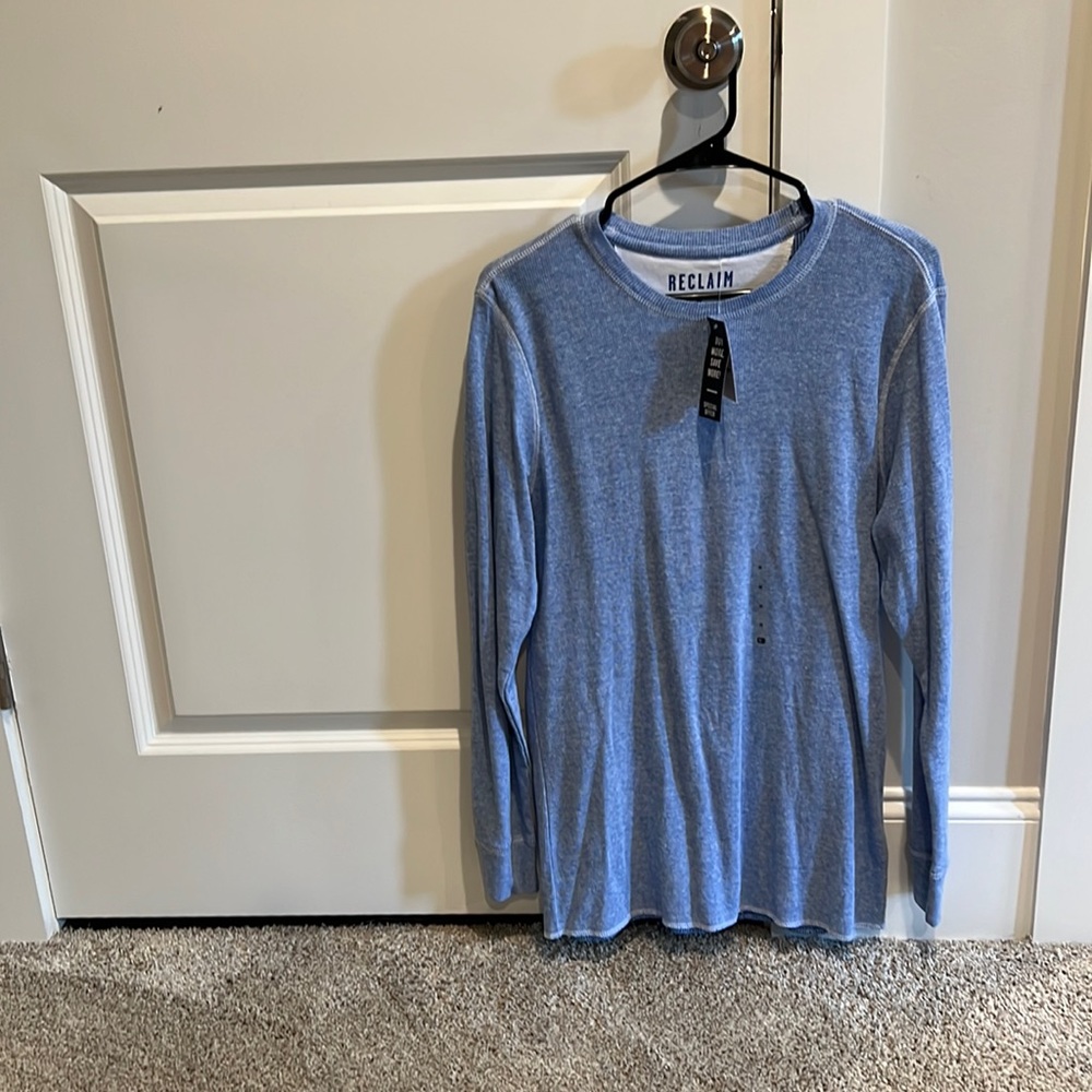 Long sleeve shirt. Never worn tag attached. Buckle Reclaim